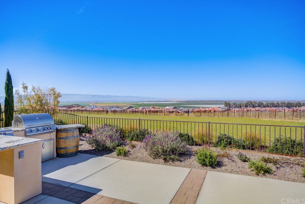 1582 Eucalyptus Road Nipomo, CA 93444 - Photo 48 of 62 a view of a lake with a garden