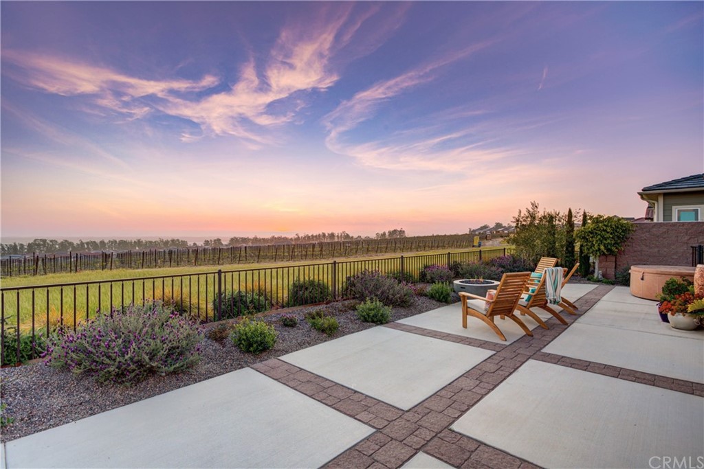 1582 Eucalyptus Road Nipomo, CA 93444 - Photo 5 of 62 a view of a lake with a patio