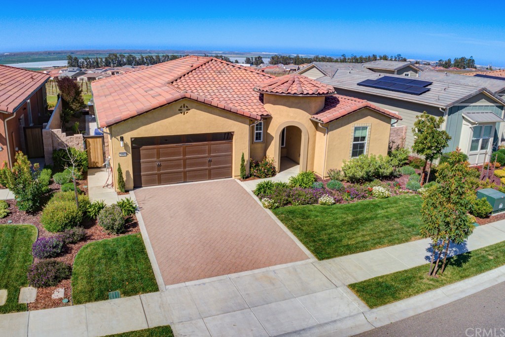 1582 Eucalyptus Road Nipomo, CA 93444 - Photo 58 of 62 a front view of a house with a yard