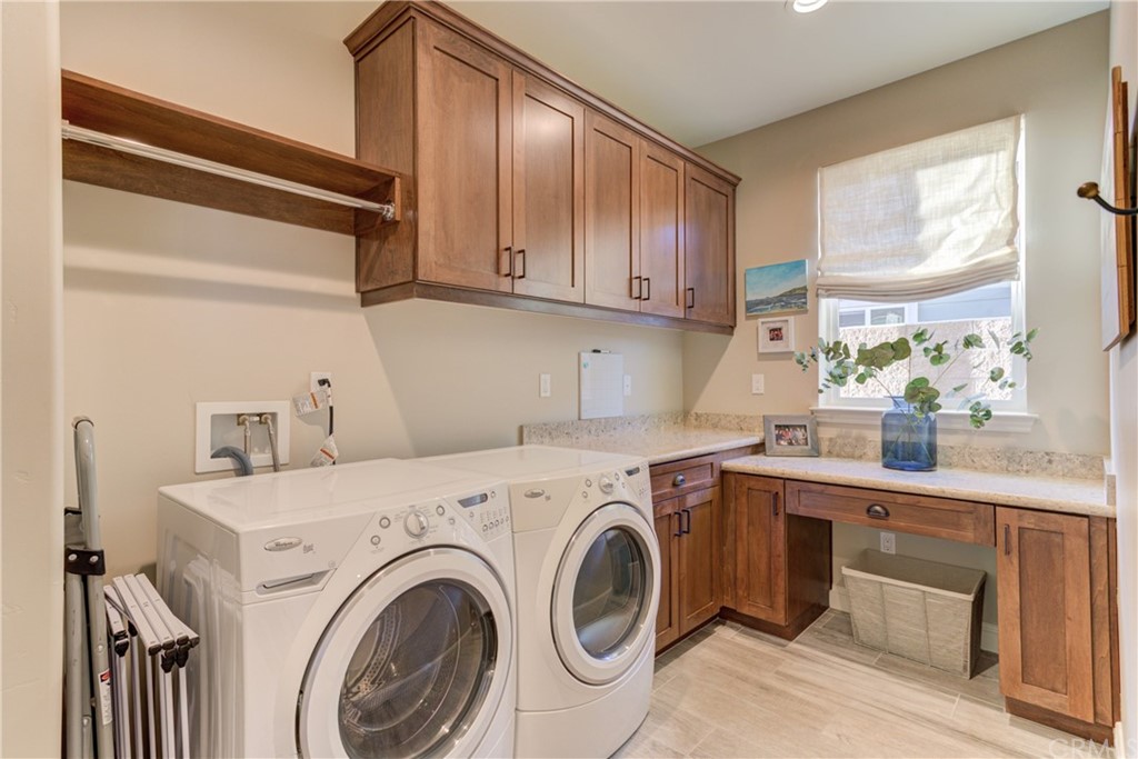 1582 Eucalyptus Road Nipomo, CA 93444 - Photo 7 of 62 a utility room with sink dryer and washer