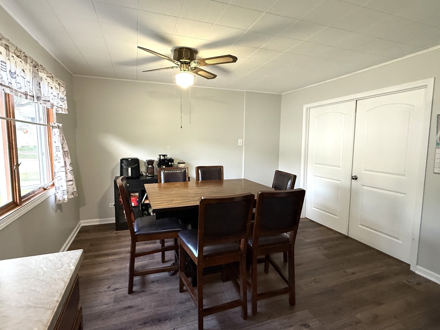 5199 Elmwood Road Oak Forest, IL 60452 - Photo 8 of 30 a view of a dining room with furniture window and wooden floor