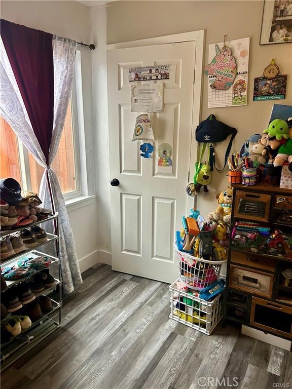 913 West Santa Fe Avenue Merced, CA 95340 - Photo 11 of 14 a room with gym equipment and a mirror