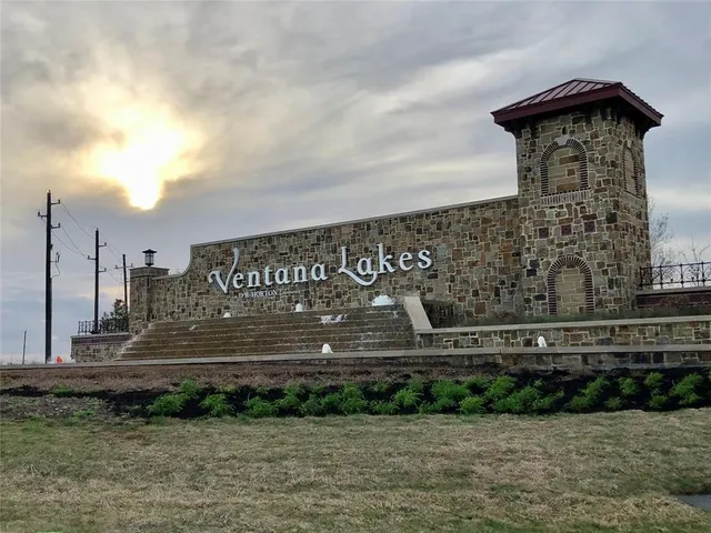 a view of pool with outdoor seating