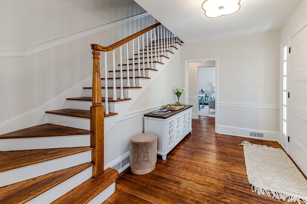 2618 Wade Avenue Raleigh, NC 27607 - Photo 24 of 62 a view of entryway and hall with wooden floor