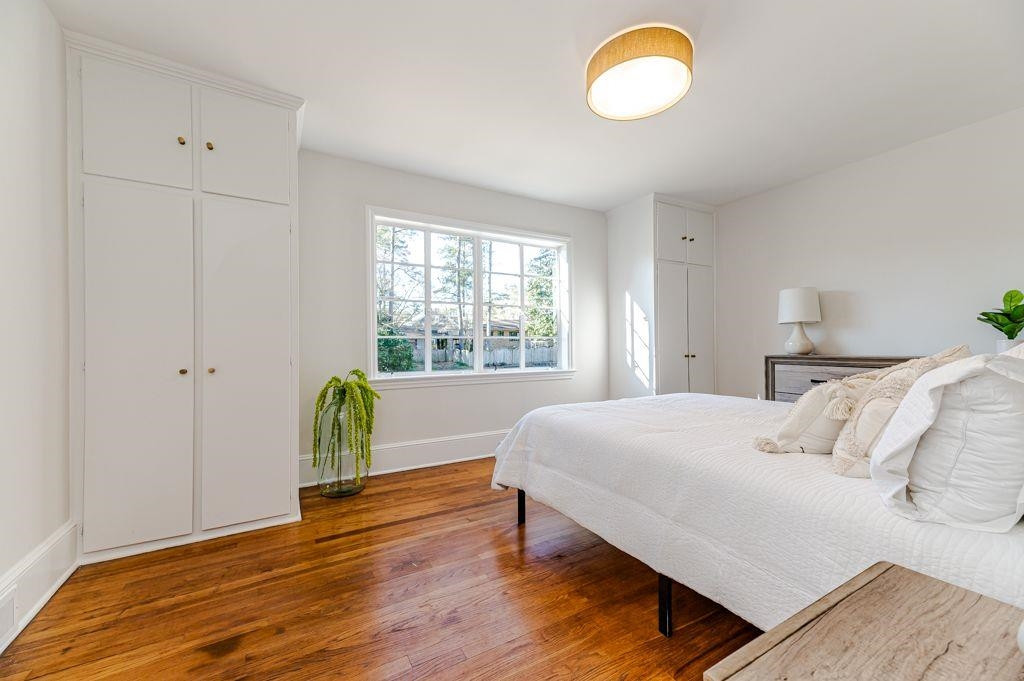 2618 Wade Avenue Raleigh, NC 27607 - Photo 26 of 62 a bedroom with a bed and a window