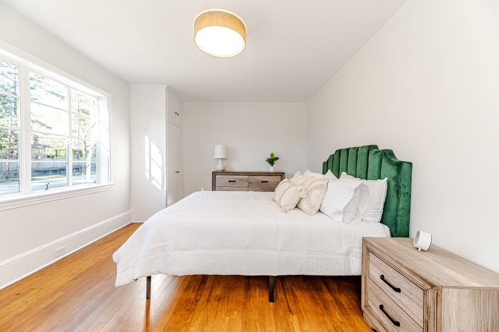 2618 Wade Avenue Raleigh, NC 27607 - Photo 27 of 62 a bedroom with a bed and a window