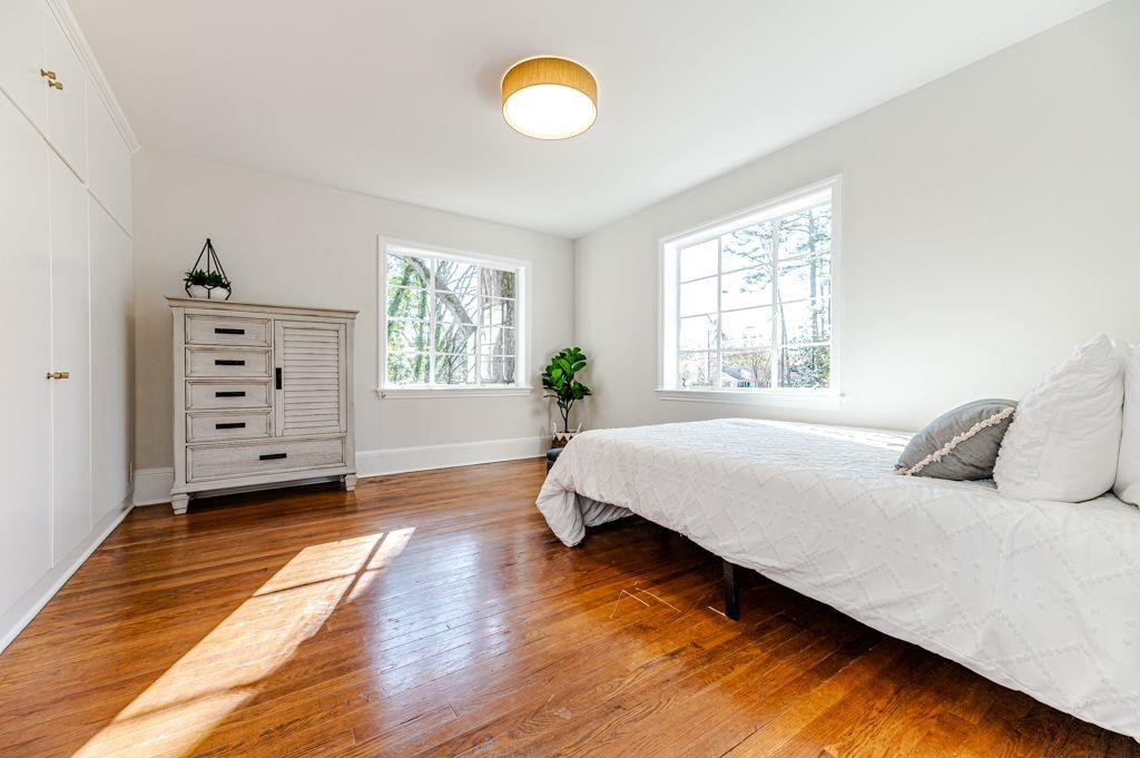 2618 Wade Avenue Raleigh, NC 27607 - Photo 28 of 62 a bedroom with a bed dresser and a window