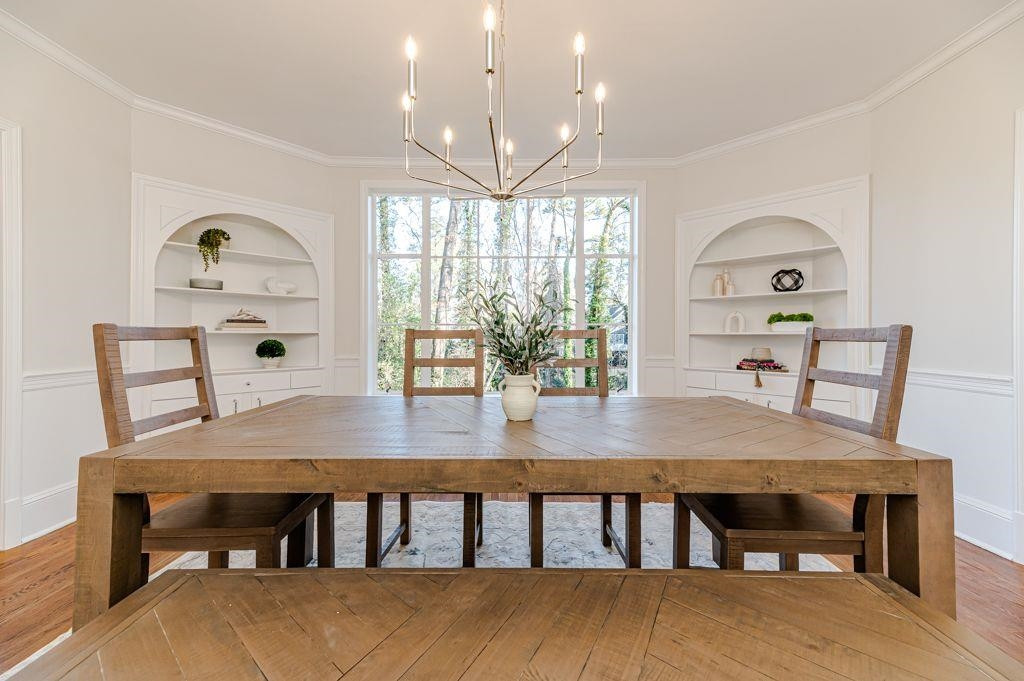 2618 Wade Avenue Raleigh, NC 27607 - Photo 48 of 62 a view of a dining room with furniture