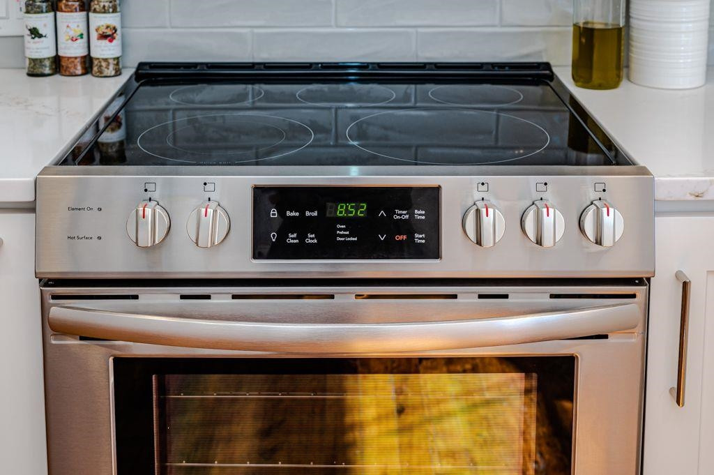 2618 Wade Avenue Raleigh, NC 27607 - Photo 5 of 62 a close view of stove and microwave oven