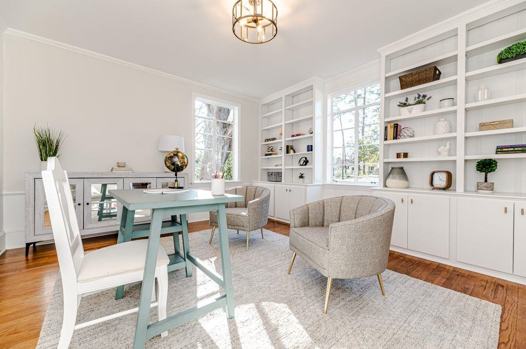 2618 Wade Avenue Raleigh, NC 27607 - Photo 51 of 62 a living room with furniture and a table