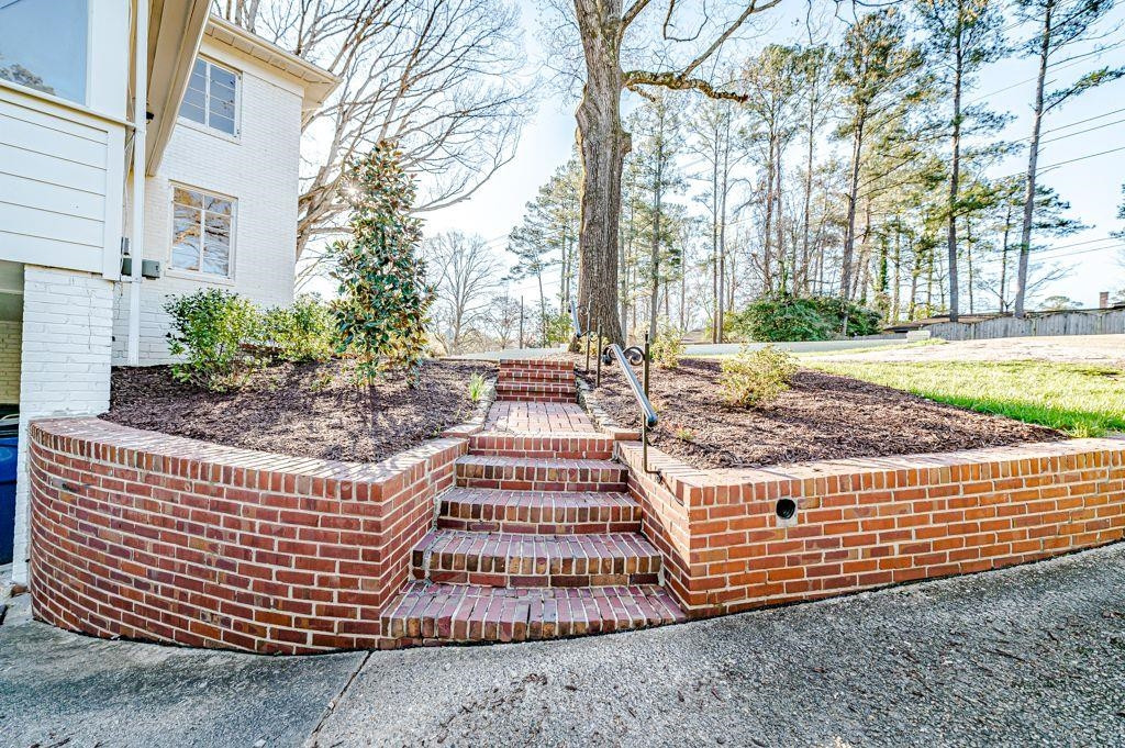 2618 Wade Avenue Raleigh, NC 27607 - Photo 57 of 62 a front view of a house having yard