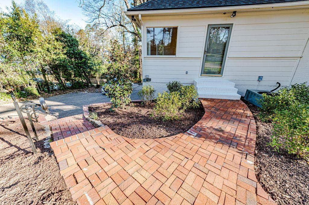 2618 Wade Avenue Raleigh, NC 27607 - Photo 58 of 62 a view of a backyard with sitting area
