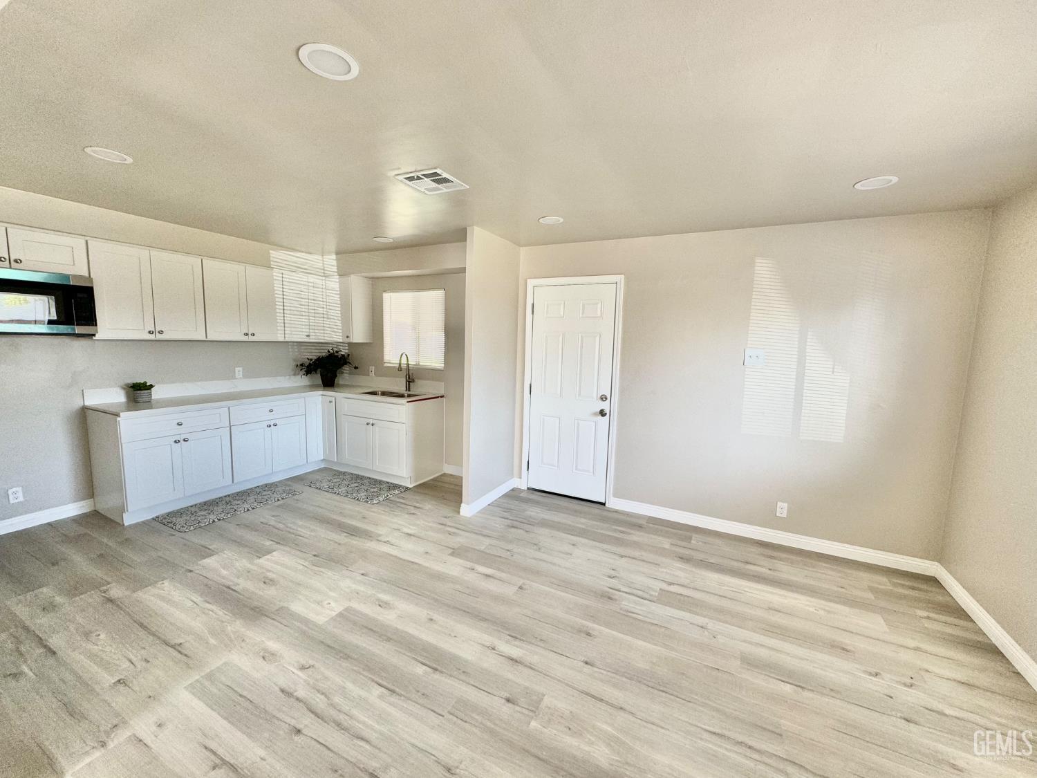Undisclosed Address Delano, CA 93215 - Photo 3 of 11 a view of a kitchen with a sink
