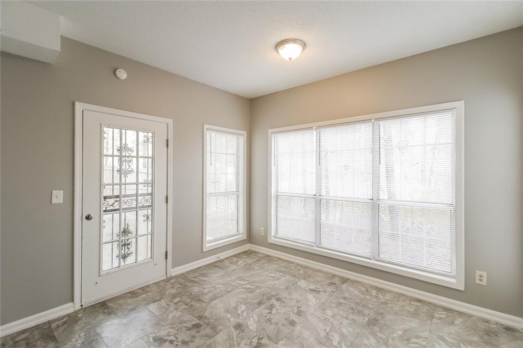 4358 Wesleyan Pointe Decatur, GA 30034 - Photo 14 of 30 an empty room with windows