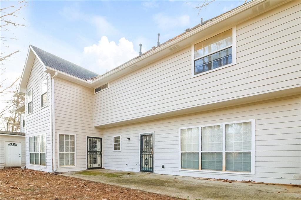 4358 Wesleyan Pointe Decatur, GA 30034 - Photo 27 of 30 a view of a house with a backyard
