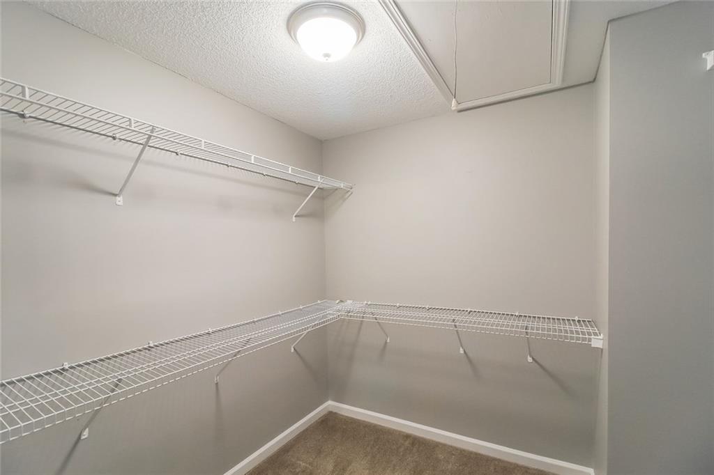 4358 Wesleyan Pointe Decatur, GA 30034 - Photo 7 of 30 a view of a room with racks on the wall