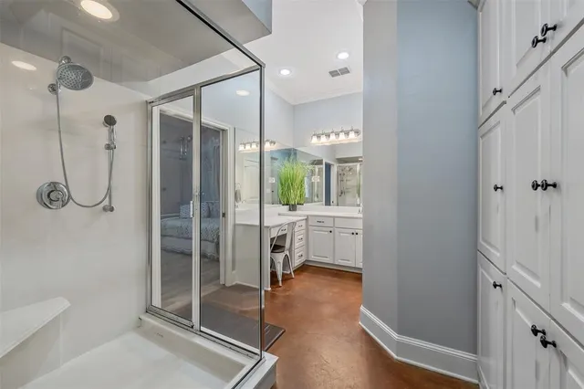 a bathroom with a shower and a toilet