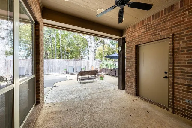 a view of a livingroom with furniture and a gate