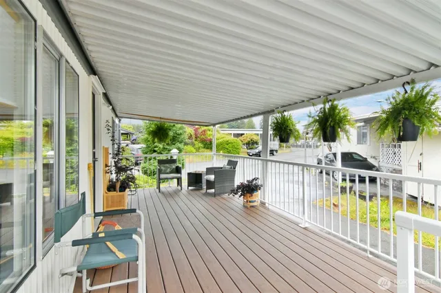 a view of a patio with swimming pool