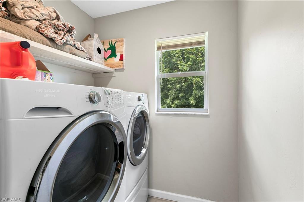 8264-8268 Matanzas Road Fort Myers, FL 33967 - Photo 14 of 33 a utility room with dryer and washer