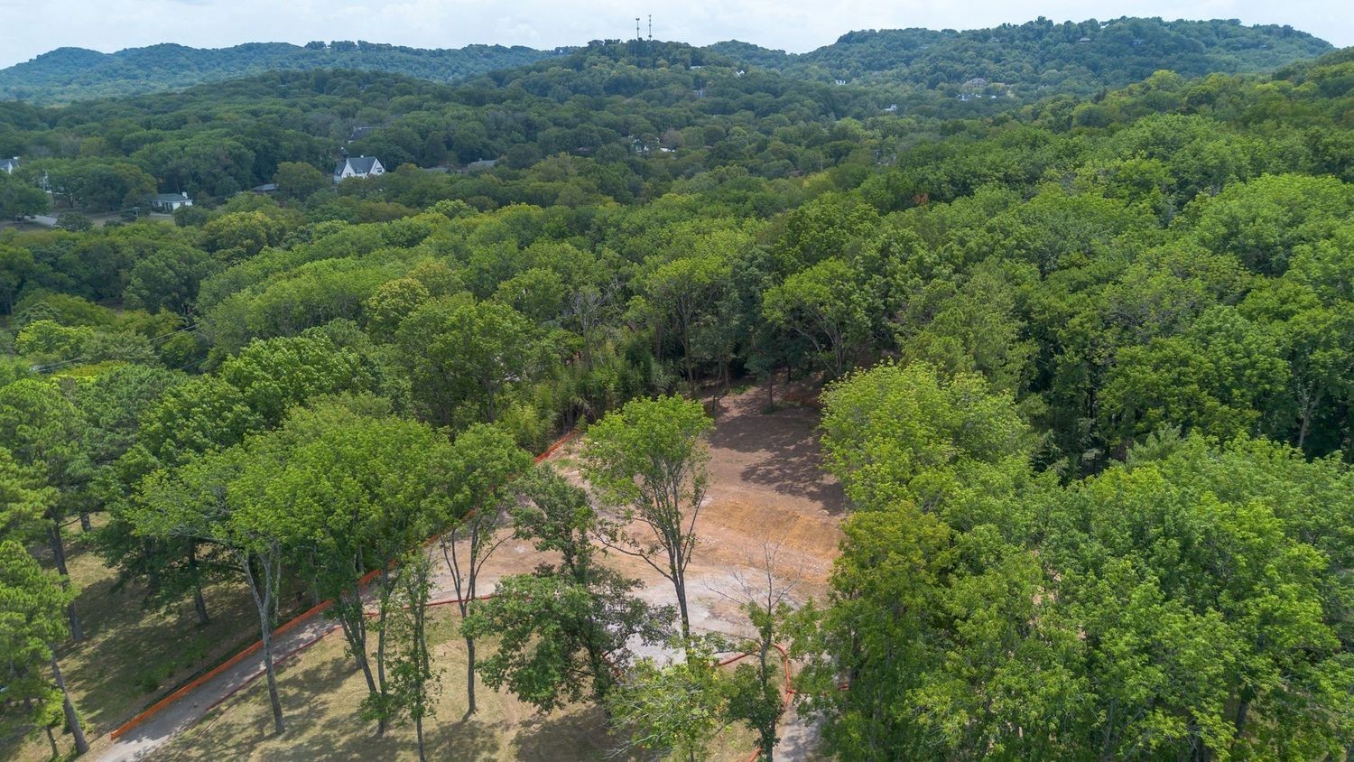1553 Harding Place Nashville, TN 37215 - Photo 3 of 3 an aerial view of green landscape with trees houses and mountain view