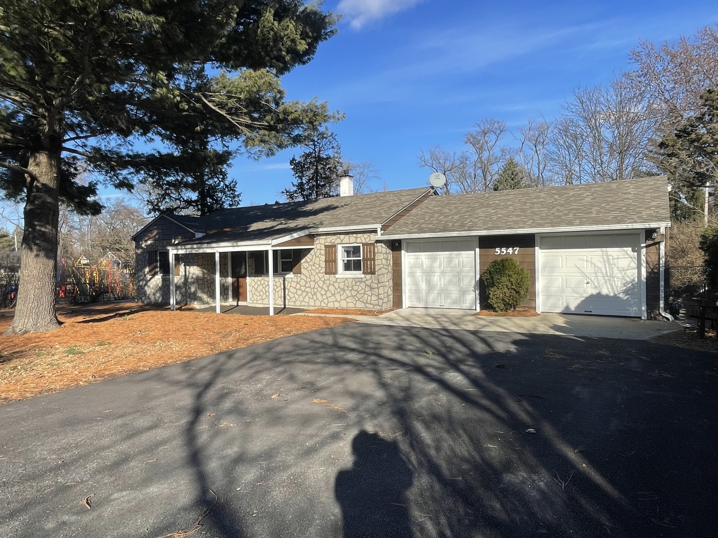5547 South Peck Avenue Countryside, IL 60525 - Photo 2 of 26 a front view of a house with a yard