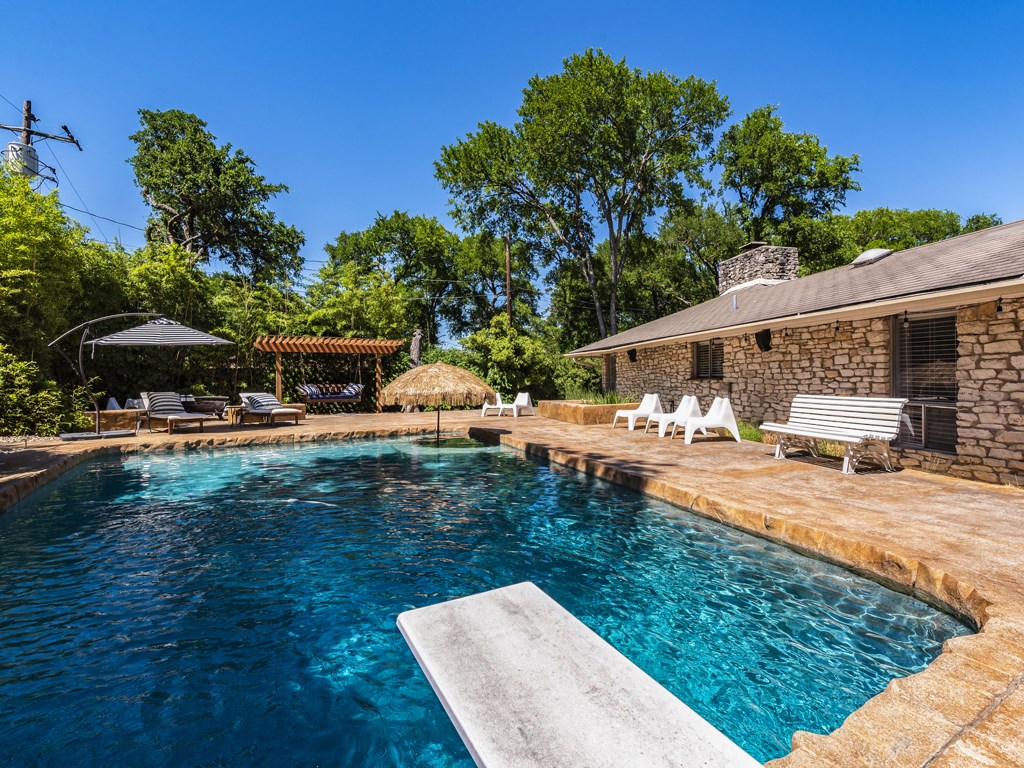 6102 Cherrylawn Circle Austin, TX 78723 - Photo 1 of 1 swimming pool view with a seating space