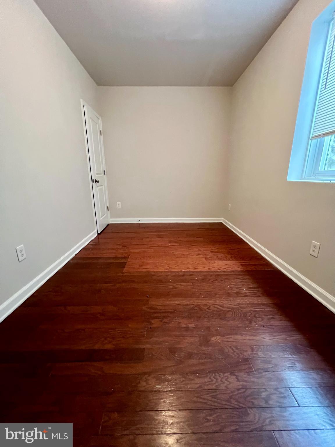2106 North 17th Street, Unit 2 Philadelphia, PA 19121 - Photo 12 of 31 a view of an empty room with wooden floor