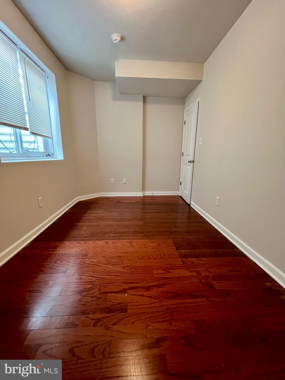 2106 North 17th Street, Unit 2 Philadelphia, PA 19121 - Photo 14 of 31 a view of an empty room with wooden floor