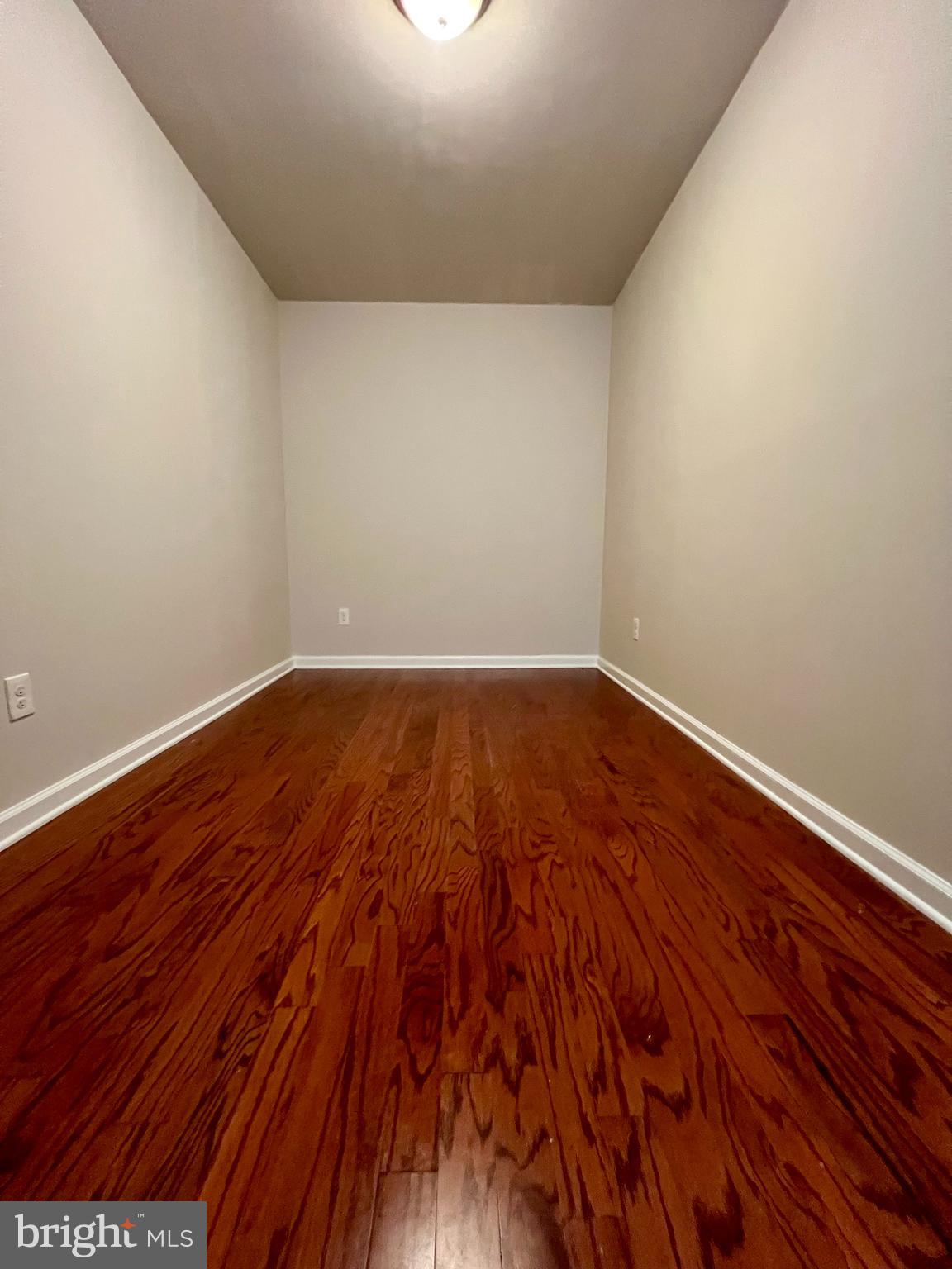 2106 North 17th Street, Unit 2 Philadelphia, PA 19121 - Photo 18 of 31 a view of room with wooden floor