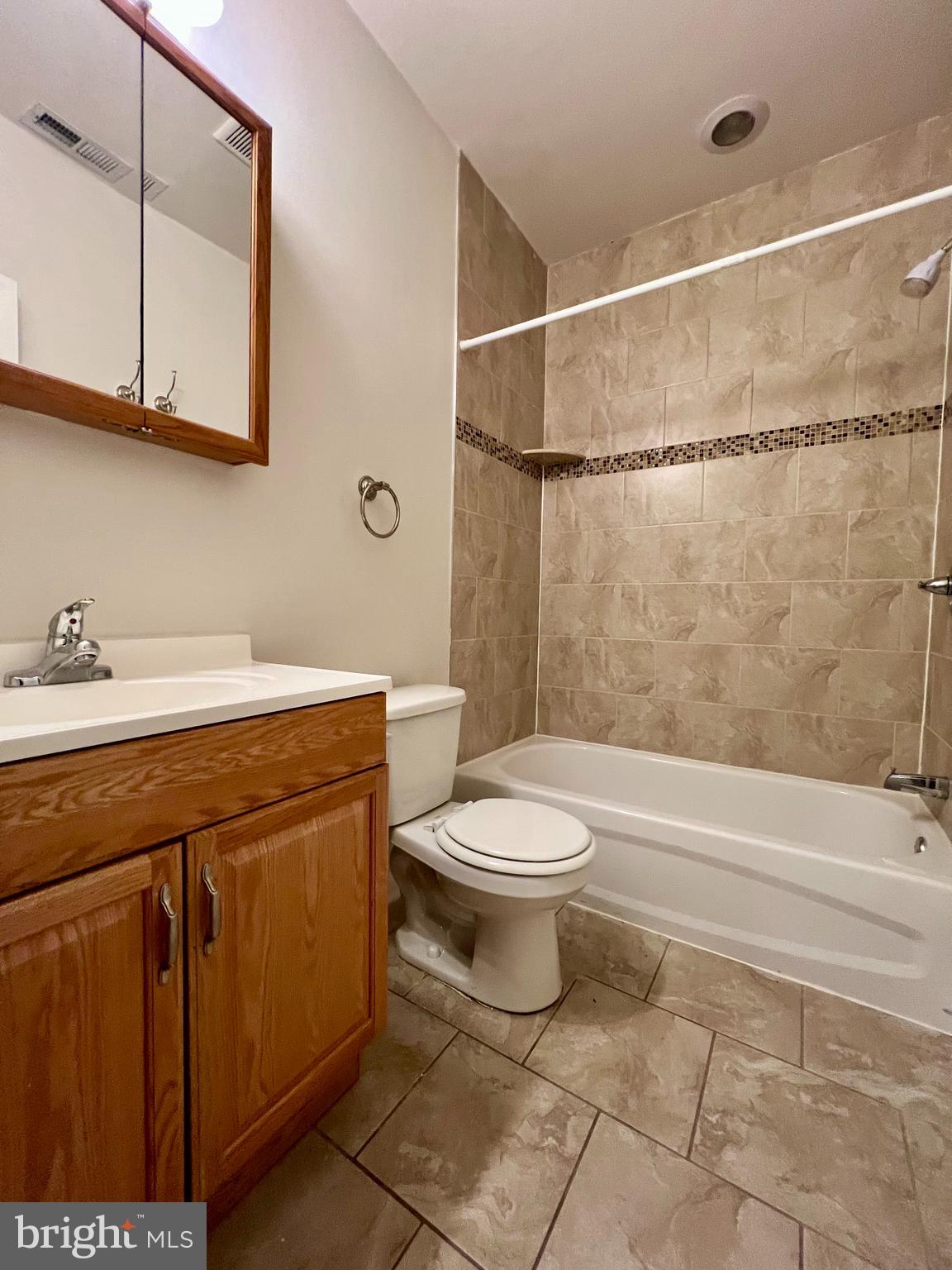 2106 North 17th Street, Unit 2 Philadelphia, PA 19121 - Photo 24 of 31 a bathroom with a sink a toilet and shower