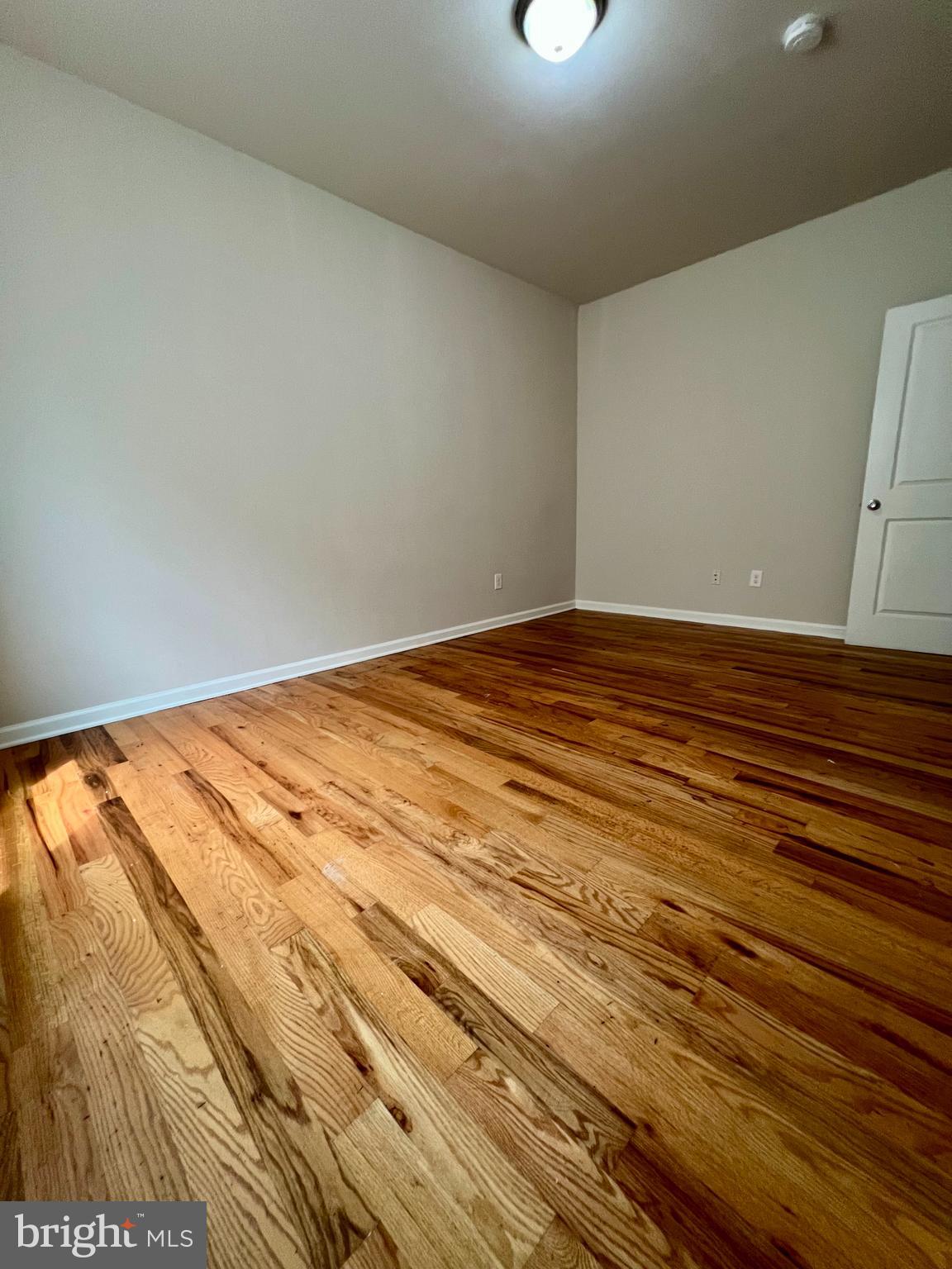 2106 North 17th Street, Unit 2 Philadelphia, PA 19121 - Photo 25 of 31 a view of a room with wooden floor