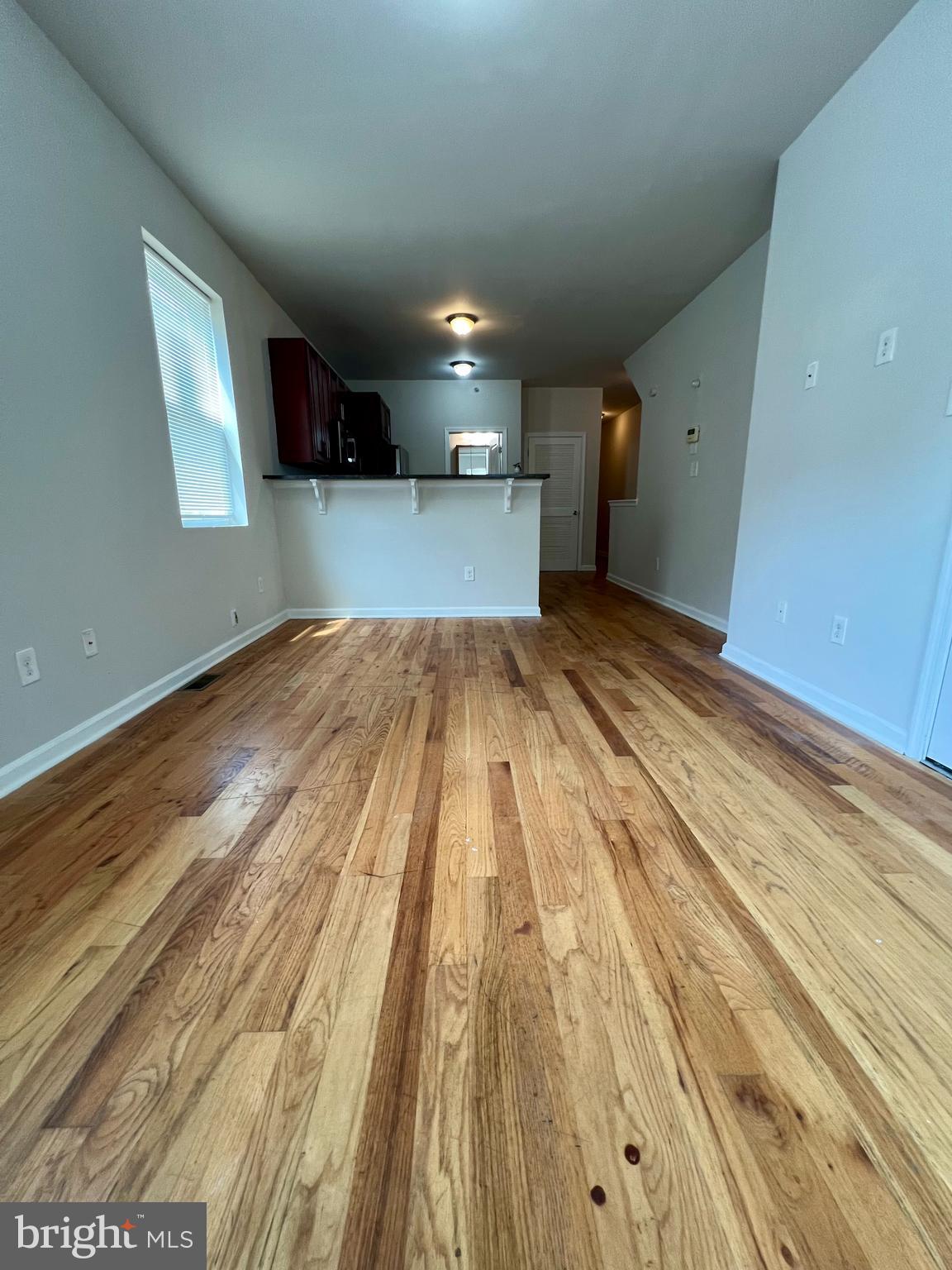 2106 North 17th Street, Unit 2 Philadelphia, PA 19121 - Photo 4 of 31 a view of a room with wooden floor
