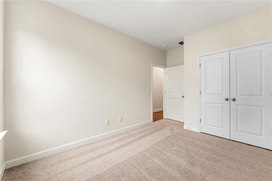 110 Lakeside Drive Anderson, SC 29621 - Photo 26 of 34 This clean, bright bedroom offers a neutral canvas ready for personalization and comfortable living.