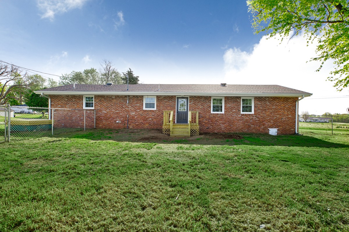 56 Blanche Road Taft, TN 38488 - Photo 22 of 27 a view of front of house with a yard