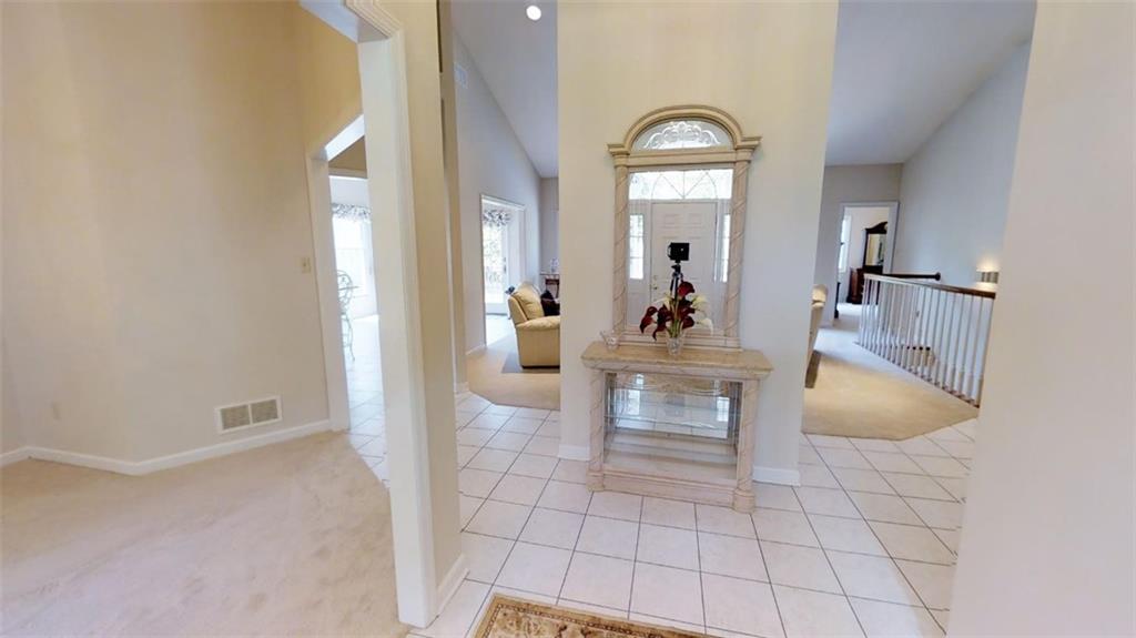 123 Bower Hill Road Venetia, PA 15367 - Photo 4 of 23 Grand Entry with Flexible Space to the Right. Formal Dinning room, extra sitting room, library? What will you use it for?