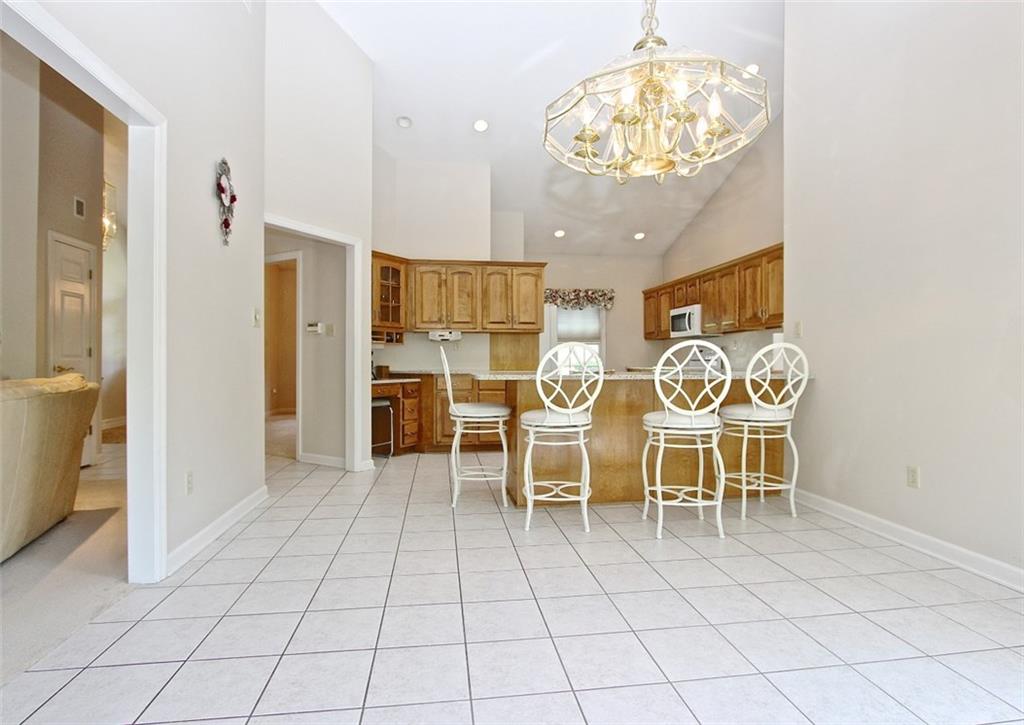 123 Bower Hill Road Venetia, PA 15367 - Photo 9 of 23 This space is just awaiting your table and opens to the deck behind!