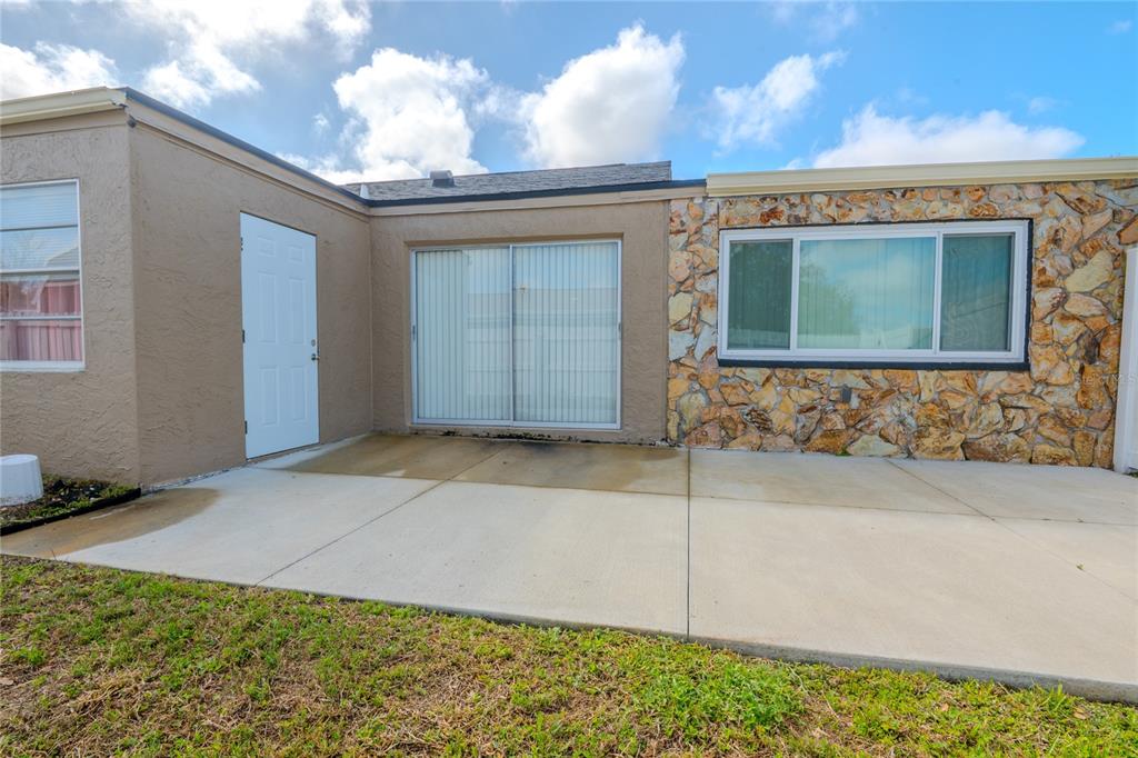 3629 Haven Drive New Port Richey, FL 34652 - Photo 19 of 20 a view of a house with a yard