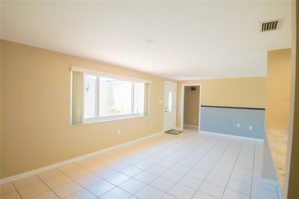 3629 Haven Drive New Port Richey, FL 34652 - Photo 7 of 20 a view of an empty room with window