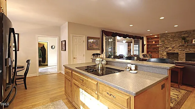 a view of empty room with a large window