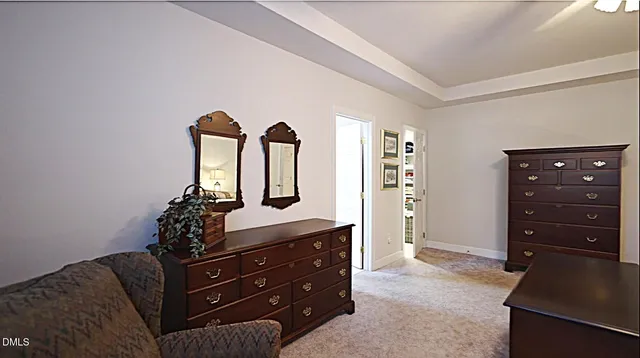 a view of a bathroom with sink and shower