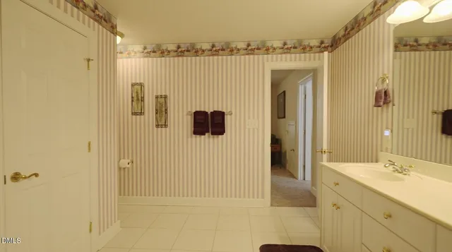 a view of a yard with large trees