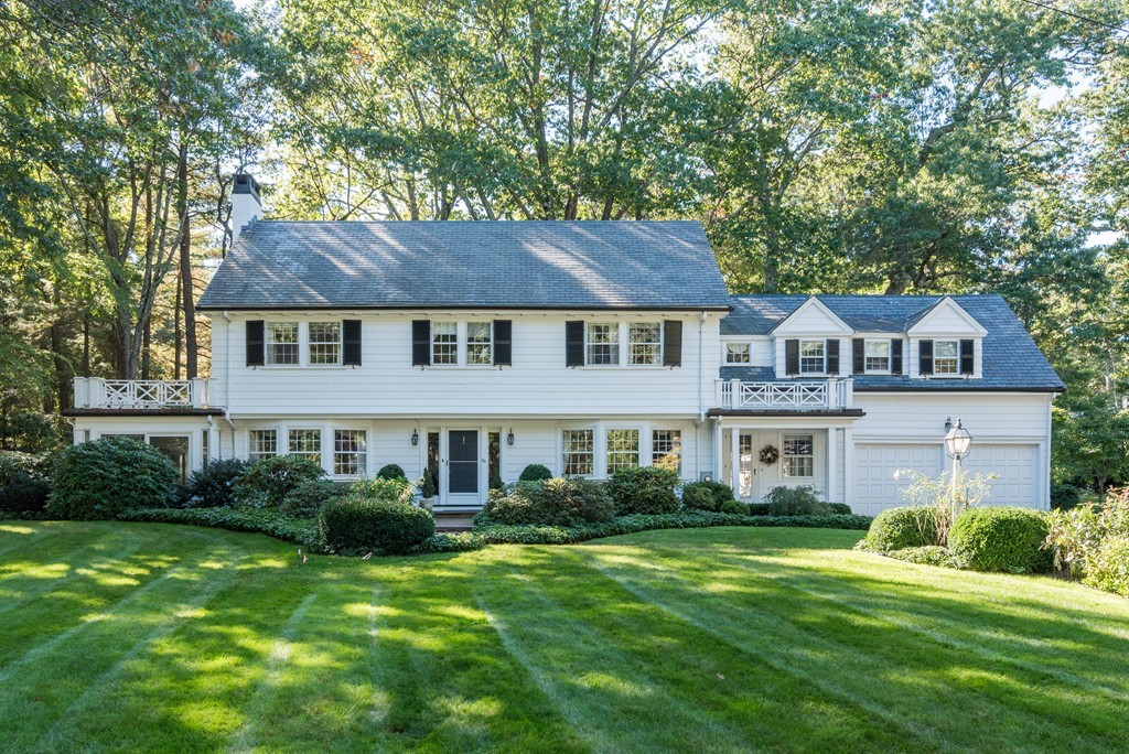 80 Dean Road Weston, MA 02493 - Photo 1 of 28 a front view of a house with a garden