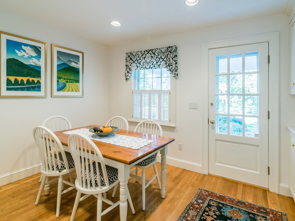 80 Dean Road Weston, MA 02493 - Photo 12 of 28 a view of a dining room with furniture and wooden floor