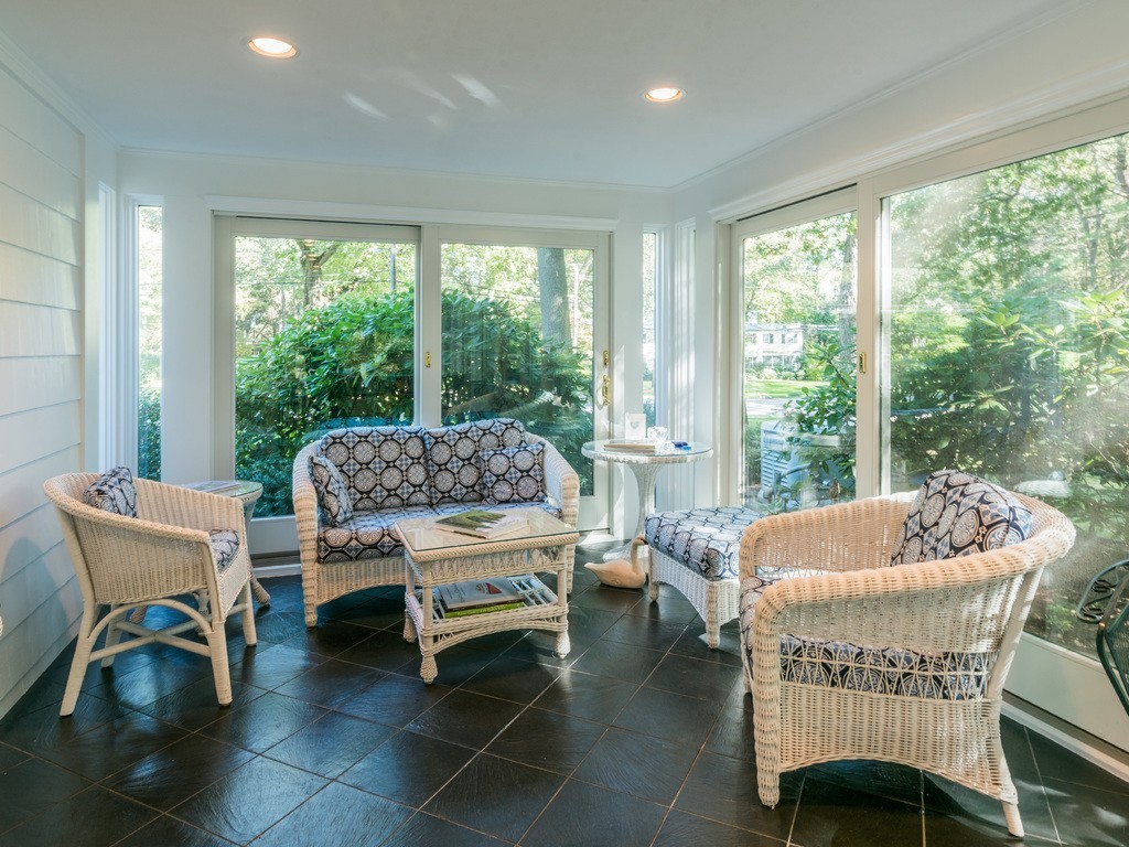 80 Dean Road Weston, MA 02493 - Photo 14 of 28 a living room with furniture and a large window