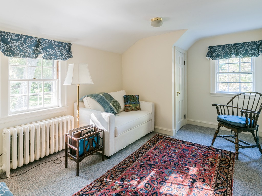 80 Dean Road Weston, MA 02493 - Photo 20 of 28 a living room with furniture and a window