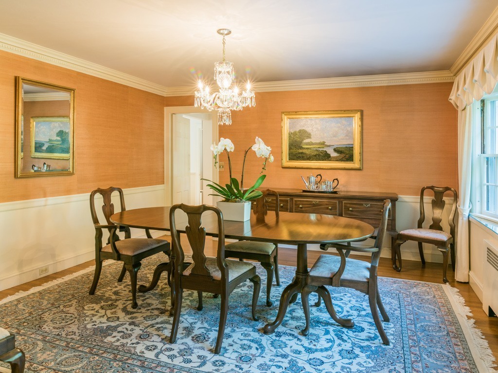 80 Dean Road Weston, MA 02493 - Photo 5 of 28 a view of a dining room with furniture and a chandelier