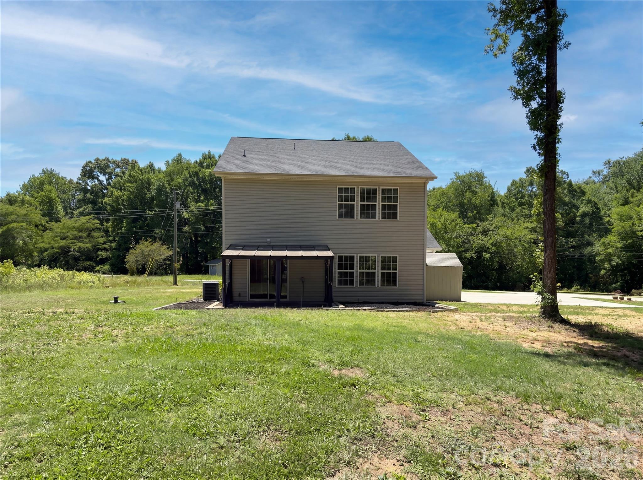 4918 Griffith Road Monroe, NC 28112 - Photo 16 of 17 a house view with a sitting space and garden