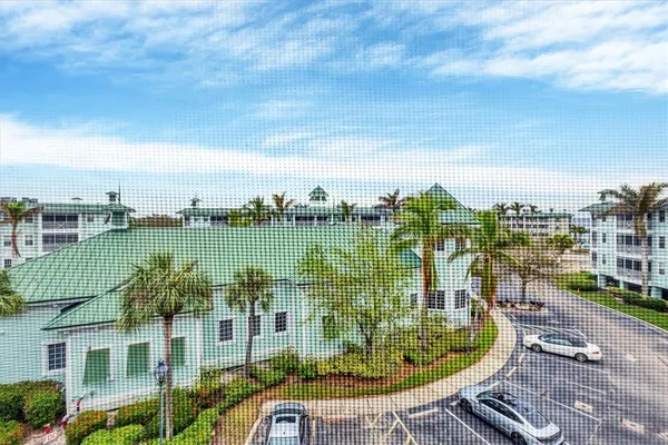 a view of a lake with a building in the background