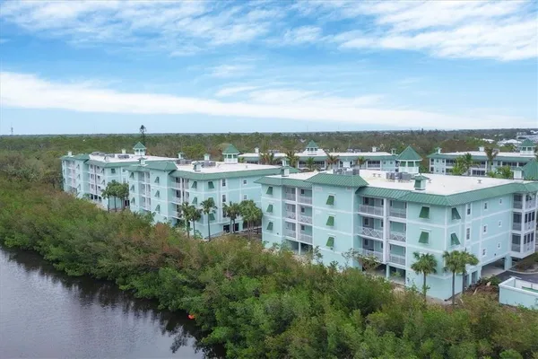a view of a lake with building in front of it